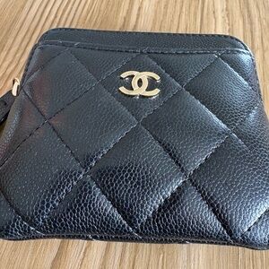 CHANEL Black Quilted Wallet with Gold Logo